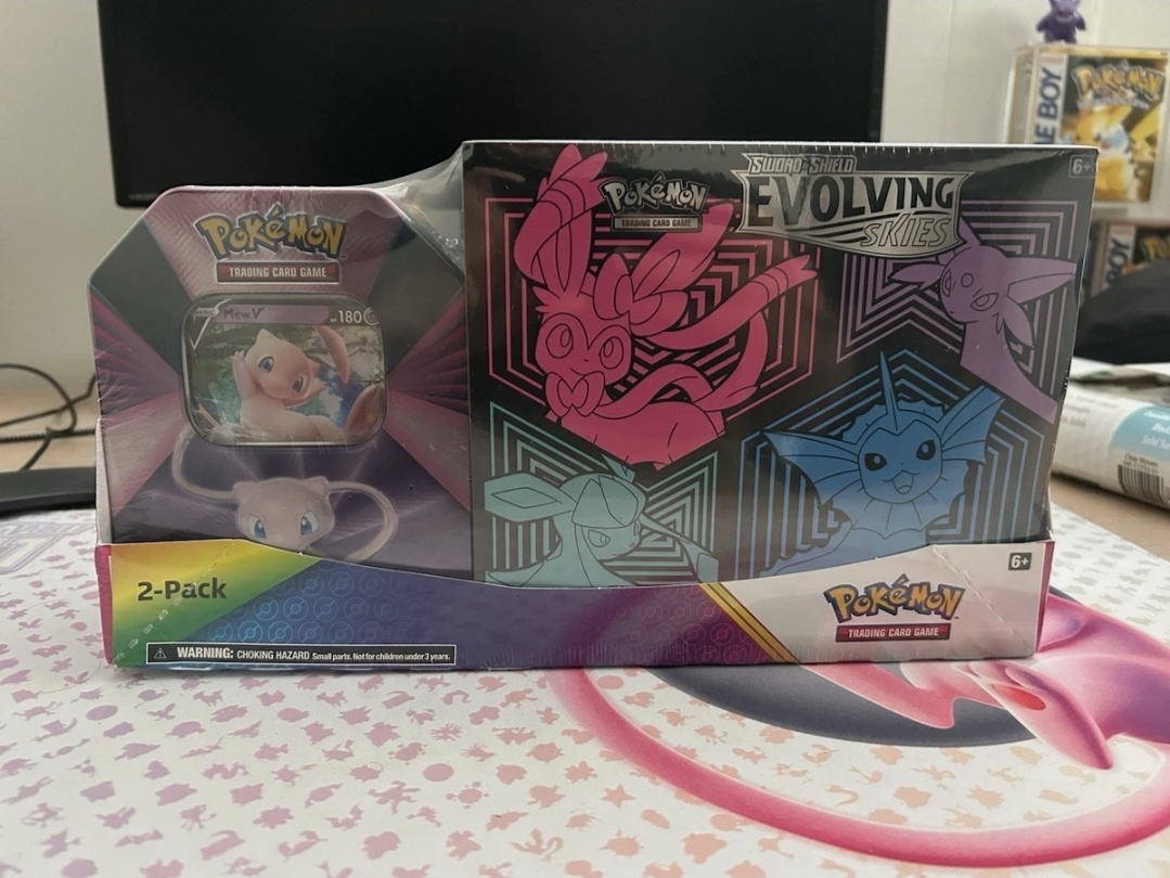 Evolving Skies Elite Trainer Box + Mew V Tin